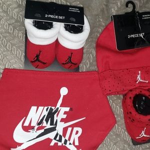 Red Nike baby items
